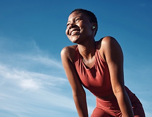Lady smiles outdoors