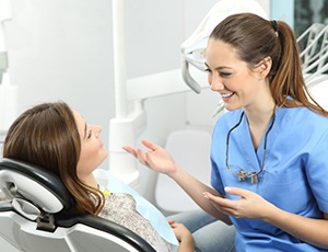 dental patient talking to her hygienist 