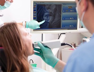 dentist examining a patient’s mouth