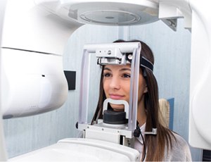 woman getting a dental X-ray taken 