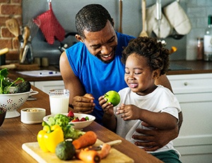 family eating healthy to prevent dental emergencies in Harrisburg