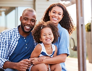 Family smiling after a visit with their United Concordia dentist